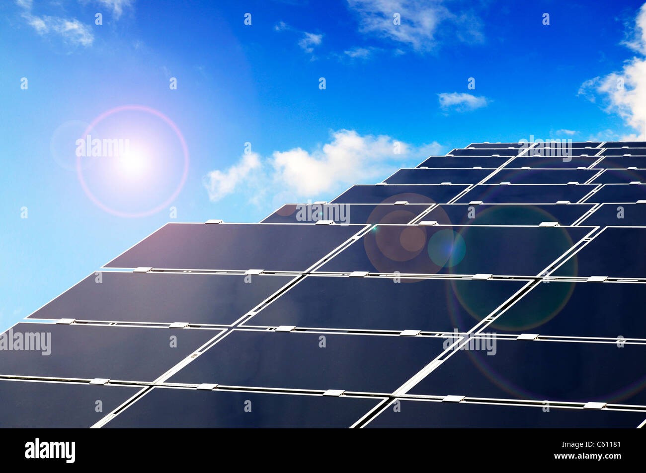 Solar Parc with Panels producing Energy by photovoltaics. Stock Photo