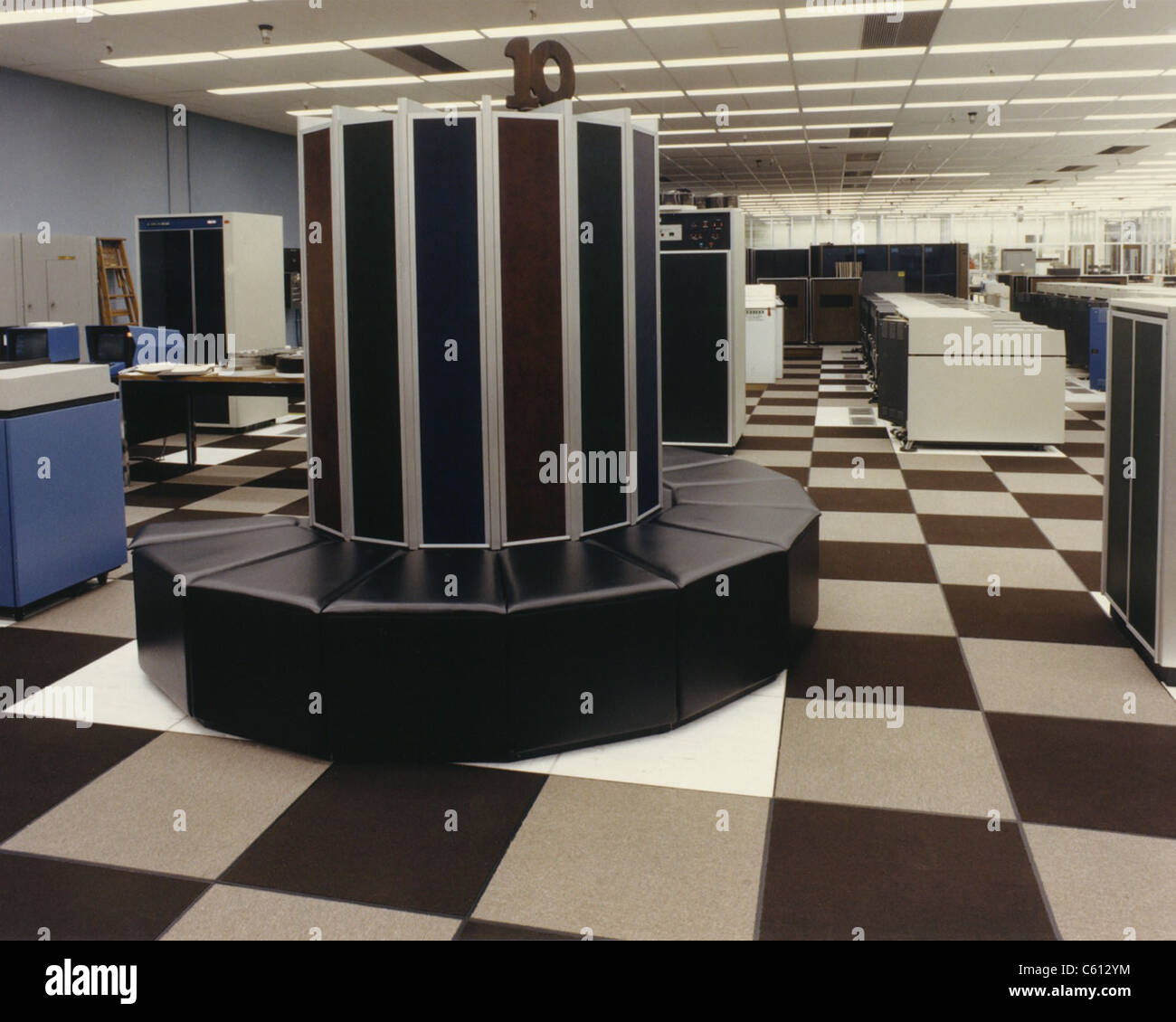 The first Cray-1 super computer was installed at Los Alamos National Laboratory (LANL) in 1976 for a six-month trial. Photo shows a Cray-1 computer in use at LANL in 1982. Stock Photo
