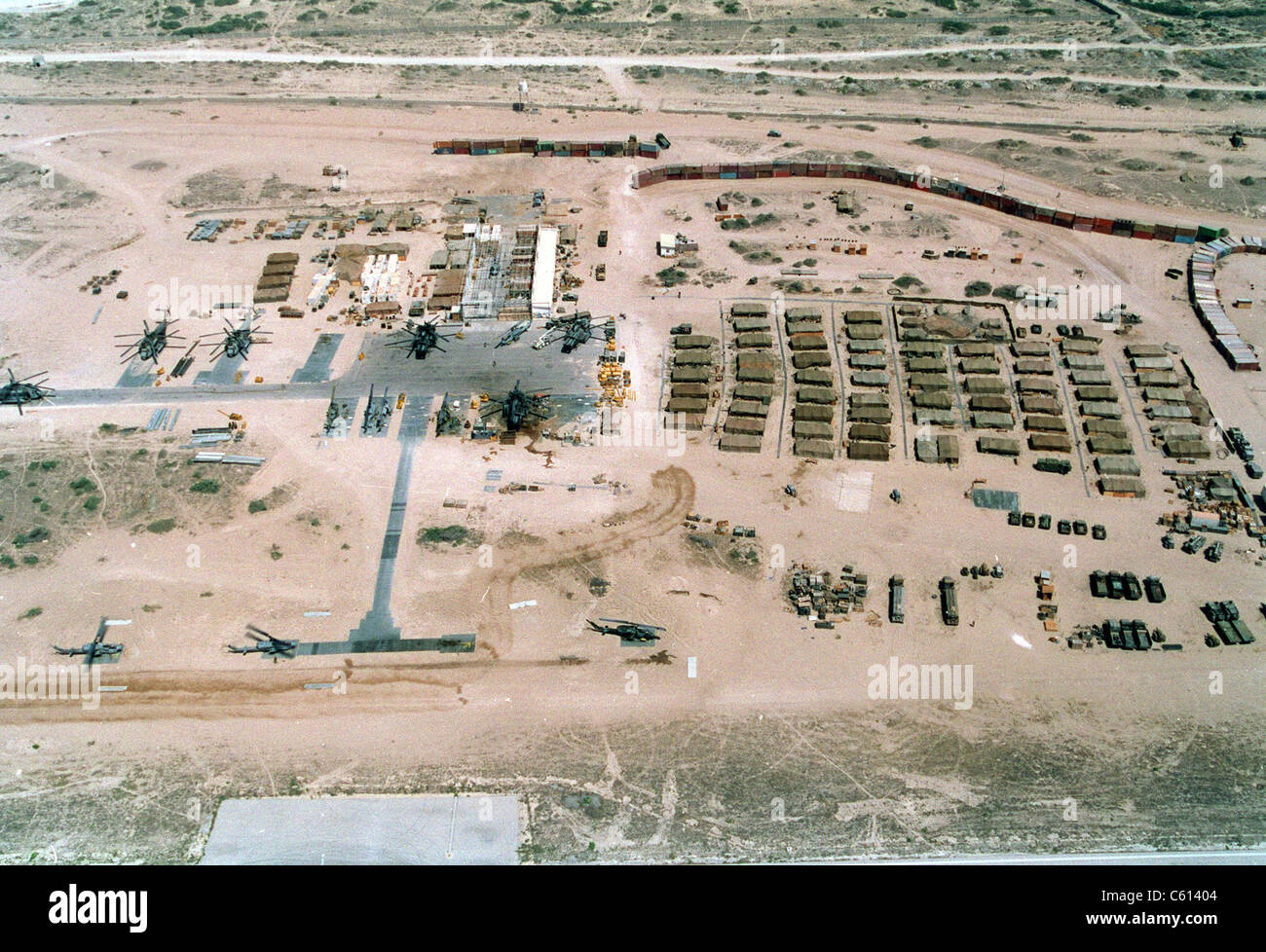 Base of the U.N. mostly U.S. Marine Forces in Somalia was built on an abandoned Soviet airfield in Mogadishu. It had a wall of shipping containers upper right to thwart random sniper fire. Feb. 25 1993. (BSLOC_2011_3_4) Stock Photo