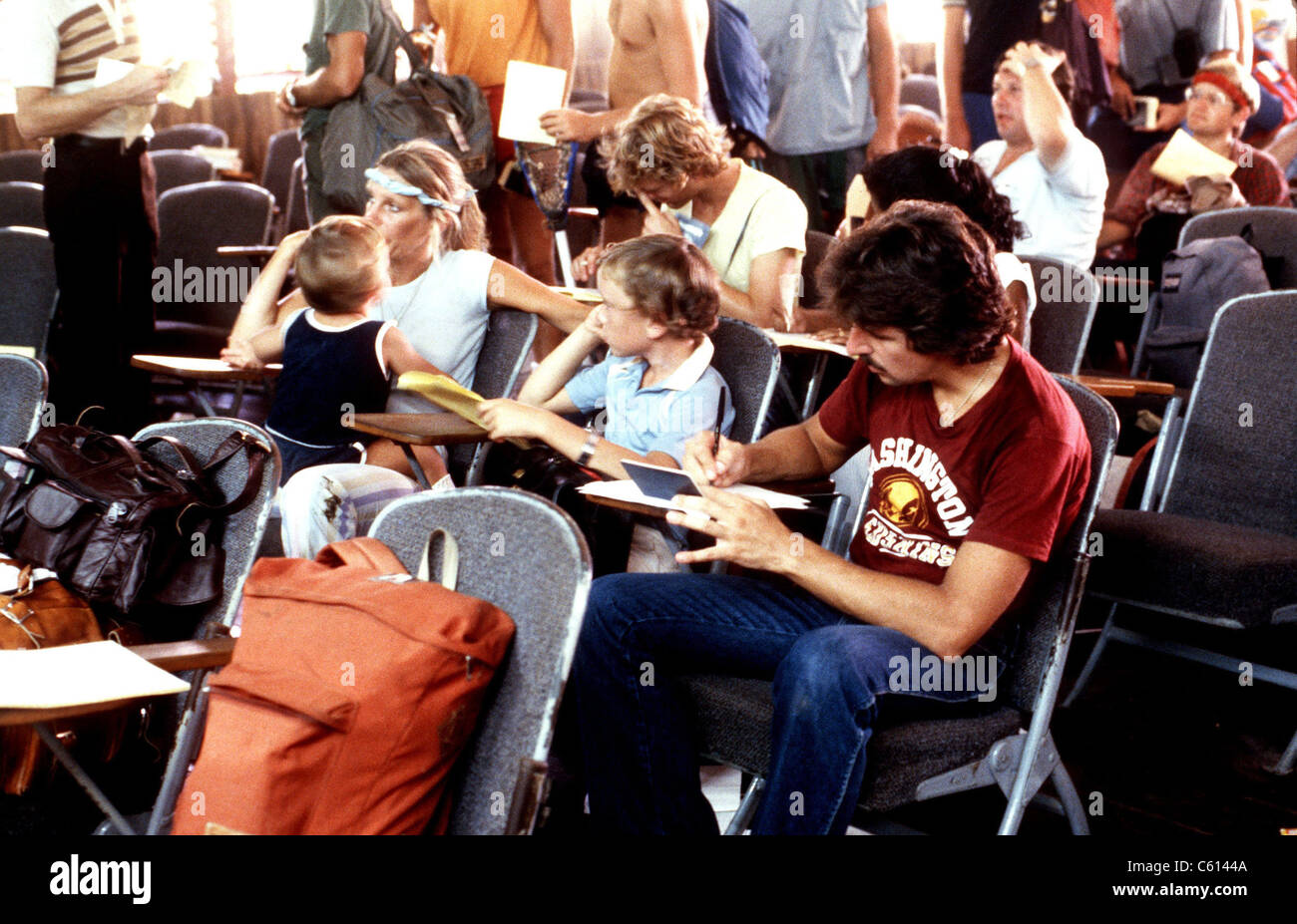 U.S. civilians awaiting evacuation from Grenada during the October 1983 U.S. invasion. American medical students were among approximately 800 U.S. citizens on Grenada. Nov 3 1983. (BSLOC 2011 3 26) Stock Photo