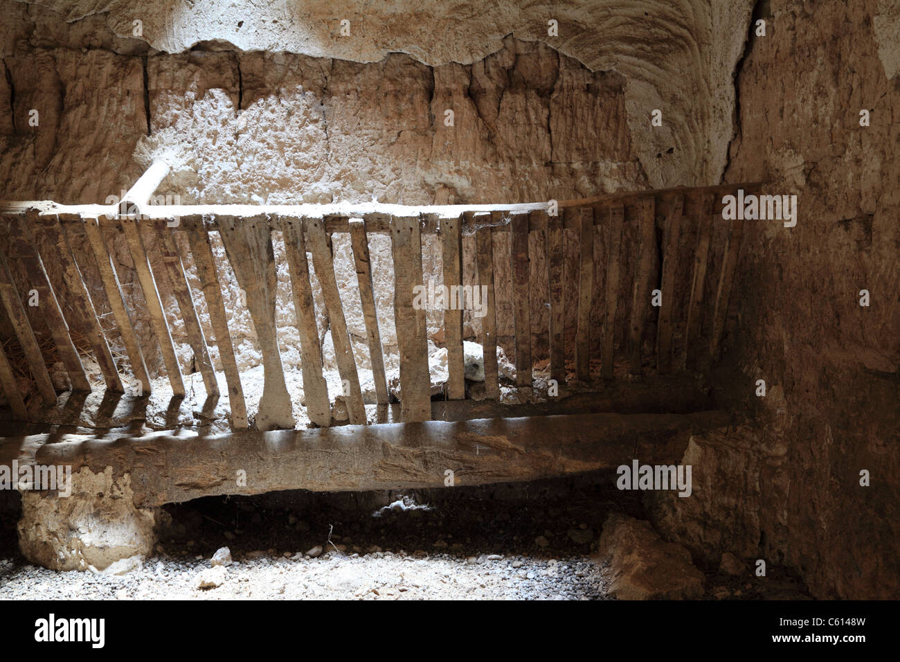 Crib in a cave house in Spain Stock Photo