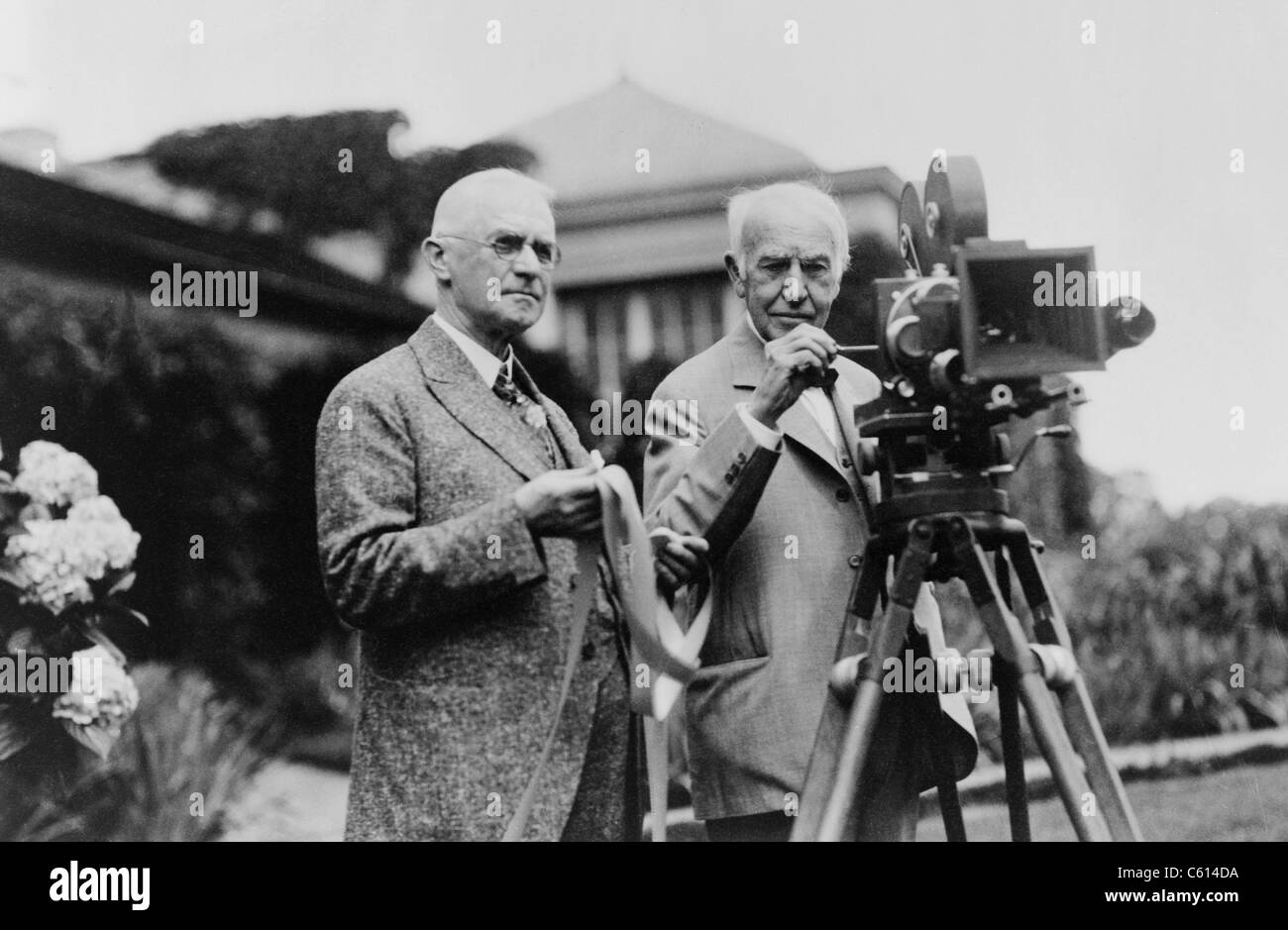 Thomas Edison 18471931 and Eastman 18541932 standing with motion picture camera ca