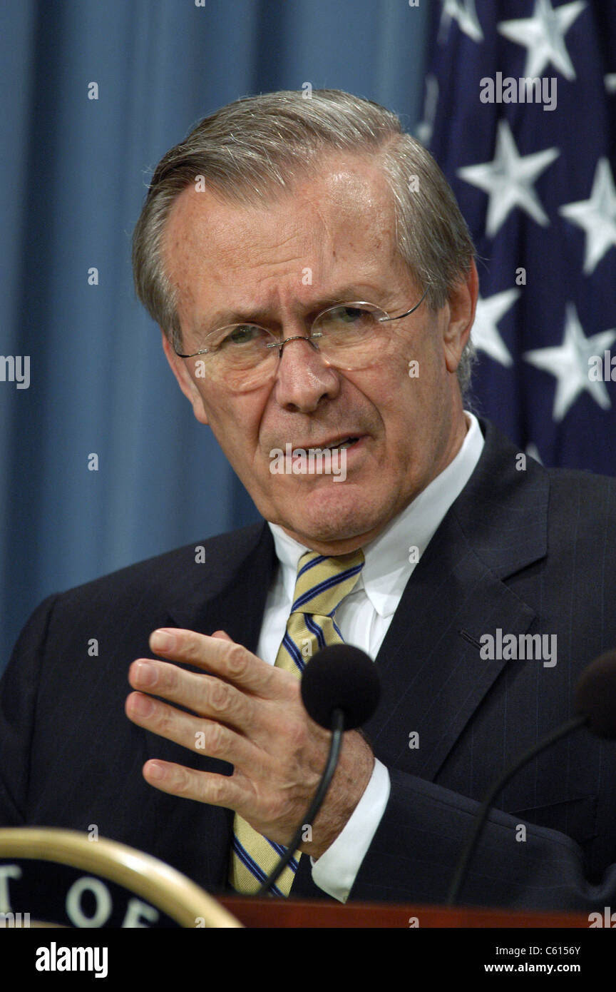 Donald H. Rumsfeld Secretary of Defense during a press briefing about Operation Iraqi Freedom the U.S. lead coalition's invasion of Iraq. April 7 2003., Photo by:Everett Collection(BSLOC 2011 6 118) Stock Photo