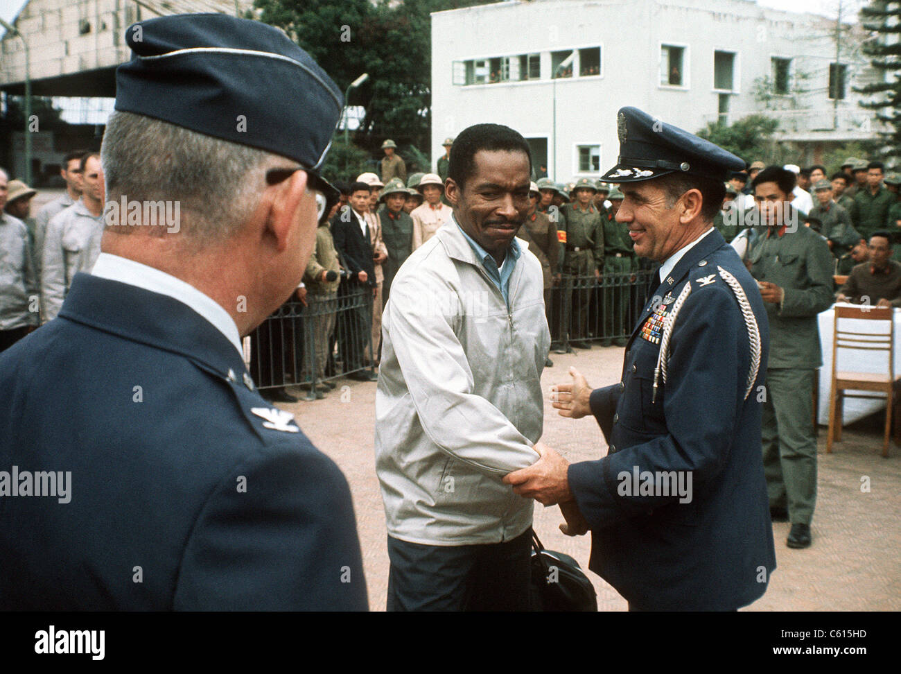 Air Force Major Norman A. McDaniel is greeted by a US delegation at a Hanoi Airport upon his release as prisoner of war in North Vietnam. Shot down on a reconnaissance mission over North Vietnam on July 20 1966 he was a POW for over 6 years. Feb-Apr 1973. (BSLOC 2011 12 350) Stock Photo