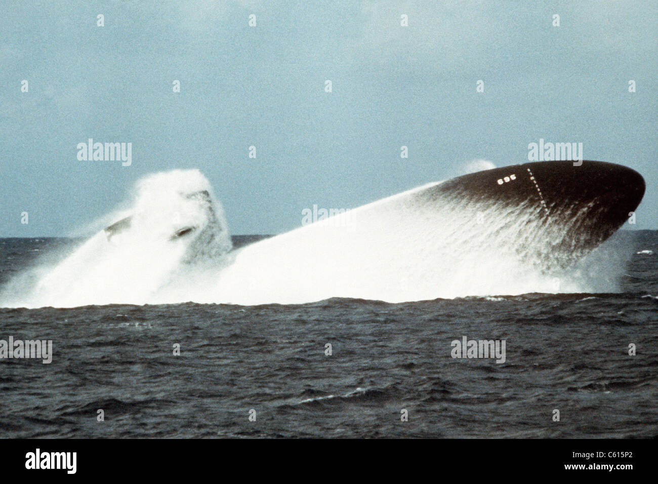 The nuclear-powered attack submarine BIRMINGHAM conducting an emergency surfacing exercise during sea trials. Nov. 19 1978. (BSLOC 2011 12 250) Stock Photo