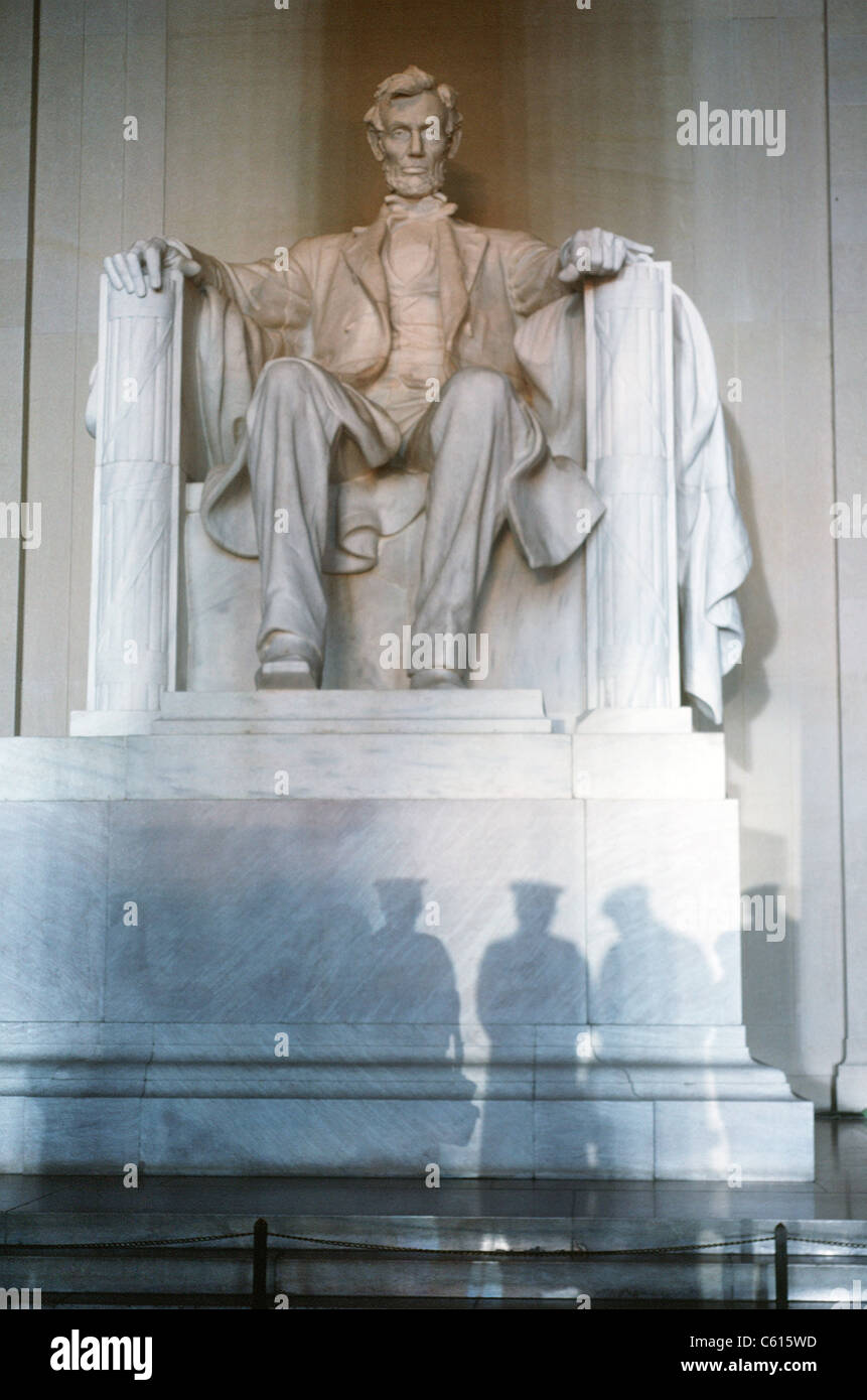 Statue at the Lincoln Memorial looms over shadows cast by the Joint Service Honor Guard rehearsing for the Inauguration of George H.W. Bush as 41st US President. Jan 18 1989. Stock Photo