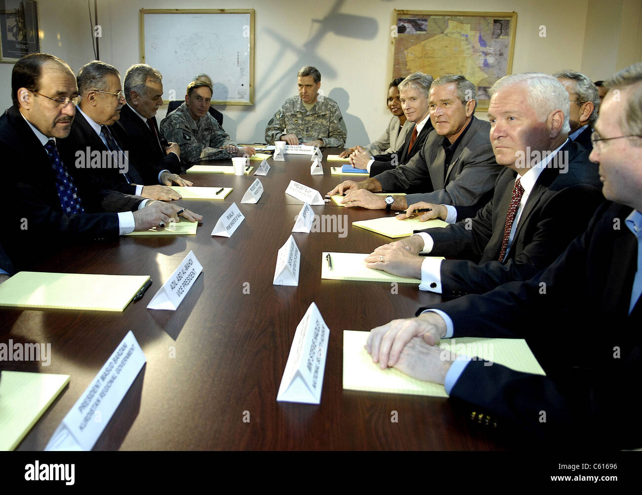 President George W. Bush Robert M. Gates Steve Hadley Ryan Crocker and Condoleezza Rice meet with Iraqi President Jalal Talabani Prime Minister Nouri al Mali ki and other Iraqi government officials at Al Asad Air Base Iraq on Sept. 3 2007. Stock Photo