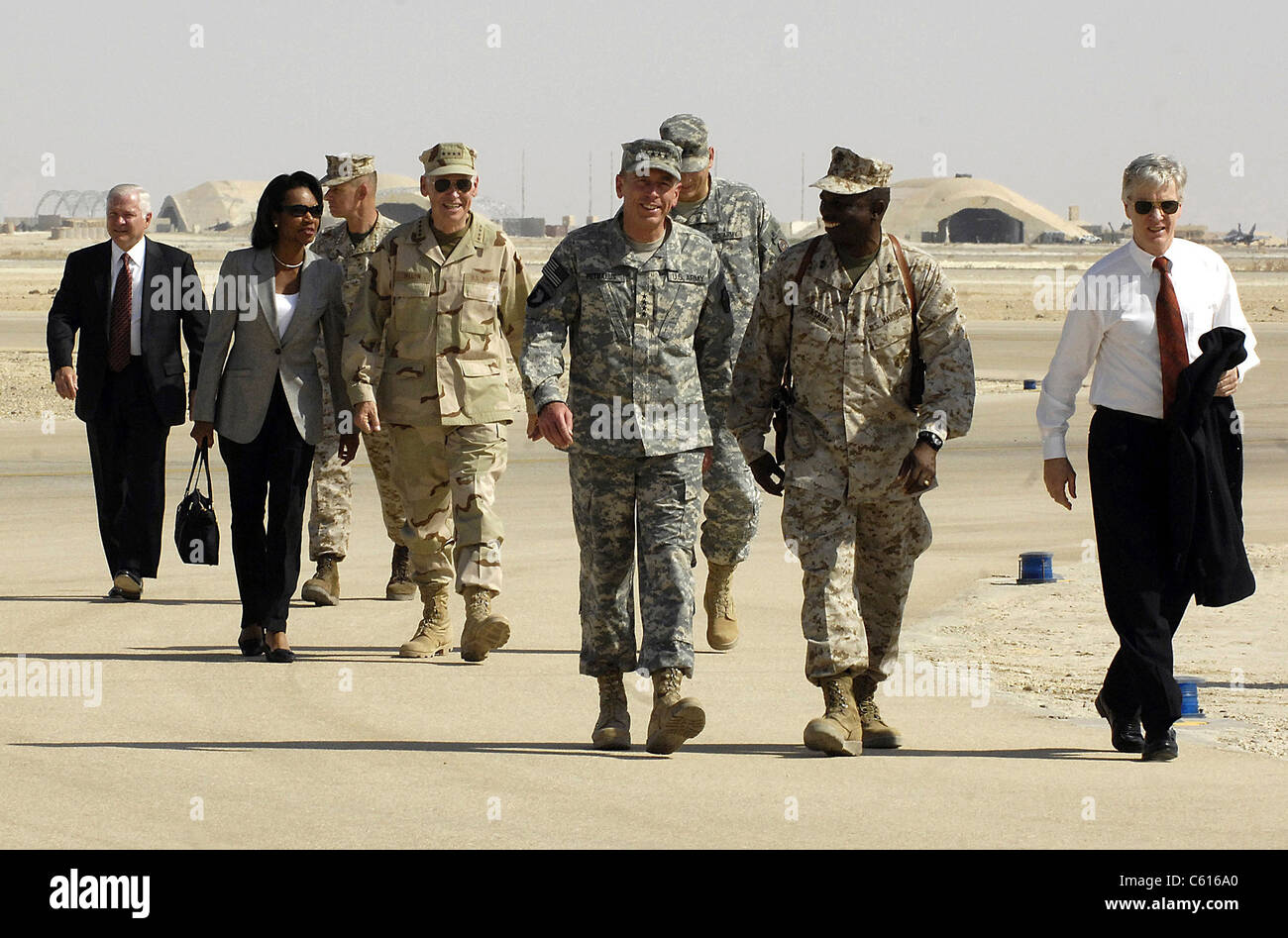 US officials and President Bush arrive at Al Asad Air Base Iraq to meet with members of the Iraqi government and sheiks from Anbar province on Sept. 3 2007. L to R Robert M. Gates Condoleezza Rice Gen. Peter Pace Adm. William J. Fallon Gen. David Petreaus Lt. Gen. Ray Odierno Maj. Gen. Walter E. Gaskin and U.S. Ambassador Ryan Crocker. Stock Photo