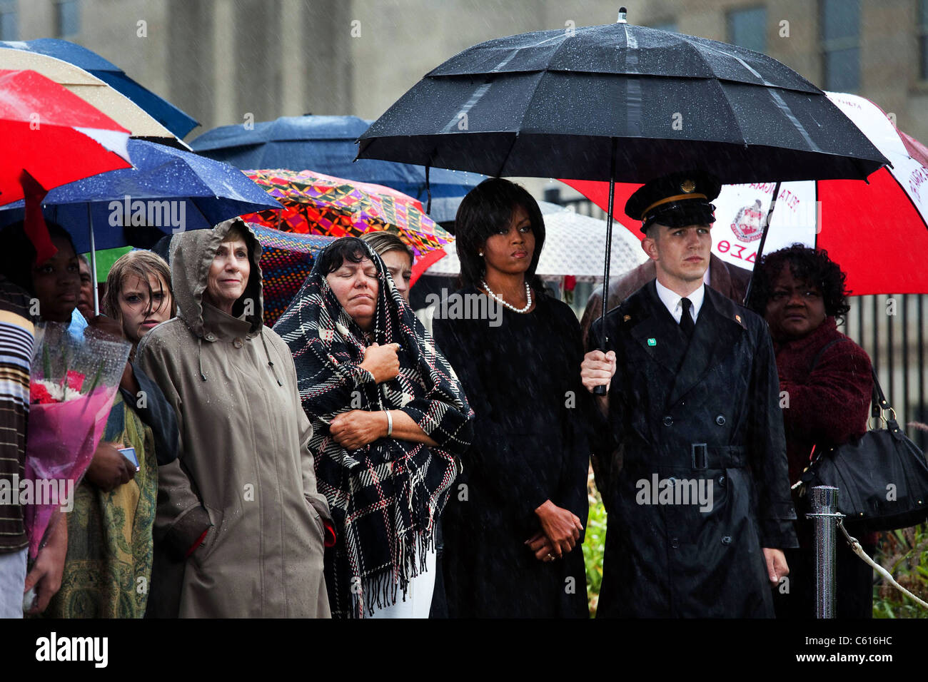 Michelle Obama attends a wreath laying ceremony at the Pentagon on the rainy eighth anniversary of the 9/11 terrorist attacks. Sept. 11 2009., Photo by: Everett Collection(BSLOC 2011 7 108) Stock Photo