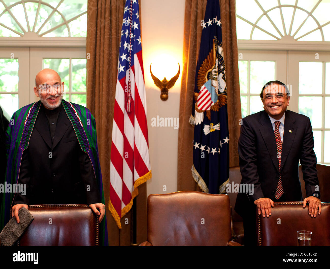 Afghan President Hamid Karzai left and Pakistan President Asif Ali Zardari wait for President Obama before a meeting at the White House. May 6 2009. (BSWH 2011 8 211) Stock Photo