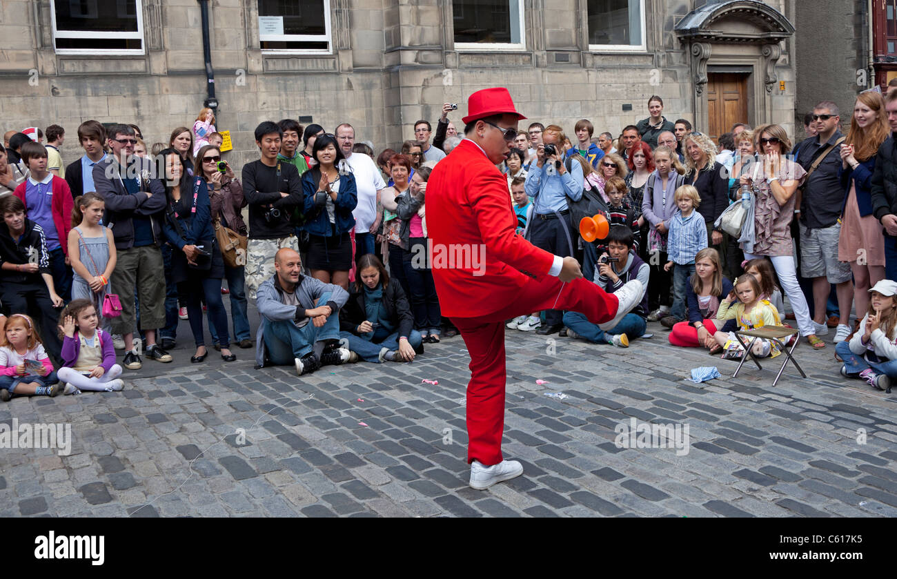 Edinburgh Fringe Festival South Korean street performers with diablo Scotland UK Europe 2011 Stock Photo