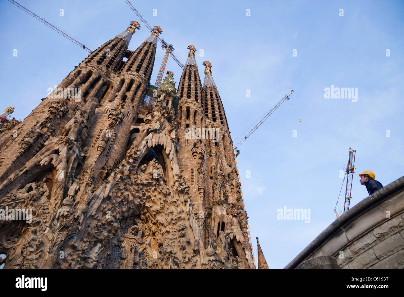 Spain, Barcelona, Construction Worker and the Sagrada Familia Stock ...