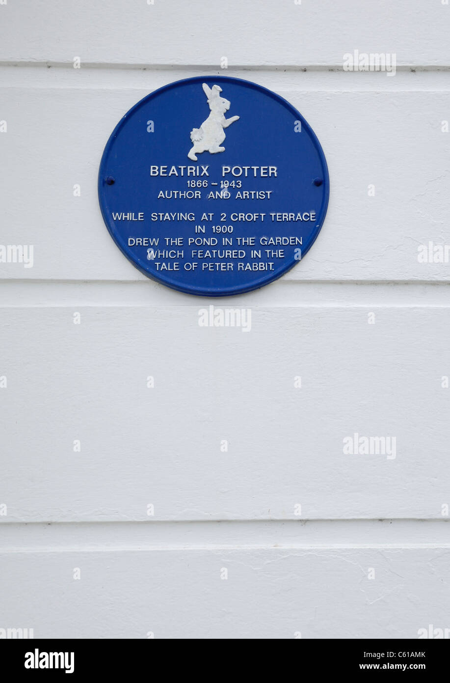 Blue plaque indicating that Beatrix Potter stayed here at 2, Croft Terrace in Tenby, Wales. Stock Photo