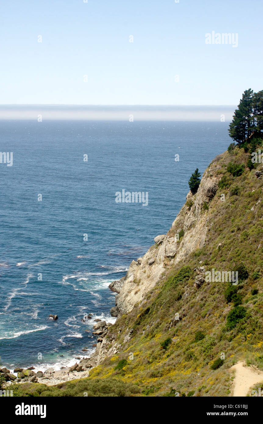 The Pacific Ocean and rocky shoreline viewed from a vista point along Highway 1 in California Stock Photo