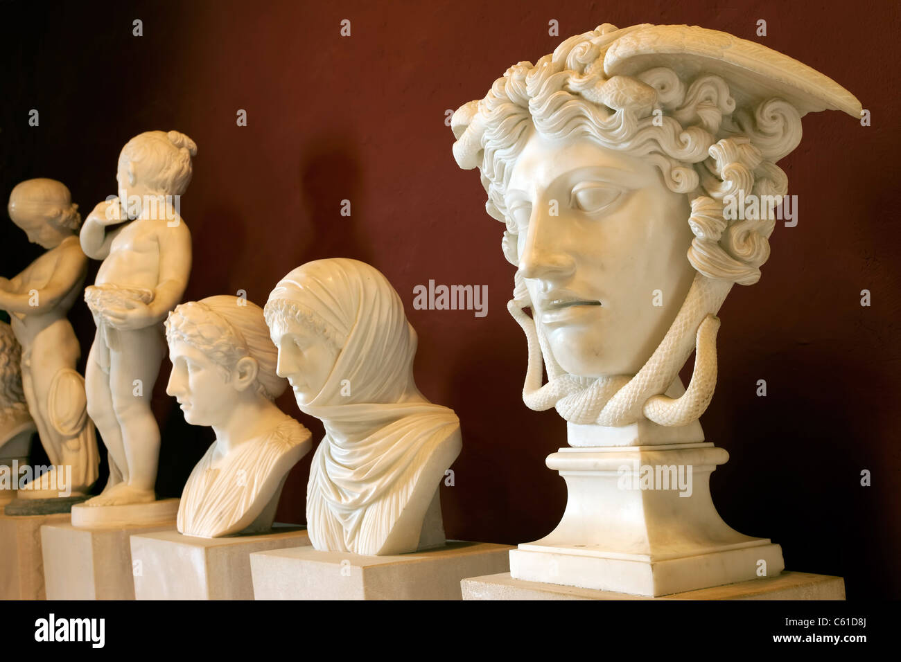 Ancient or antique Roman or Greek bust sculptures in museum at the Bellver Castle in Palma, Mallorca. Stock Photo