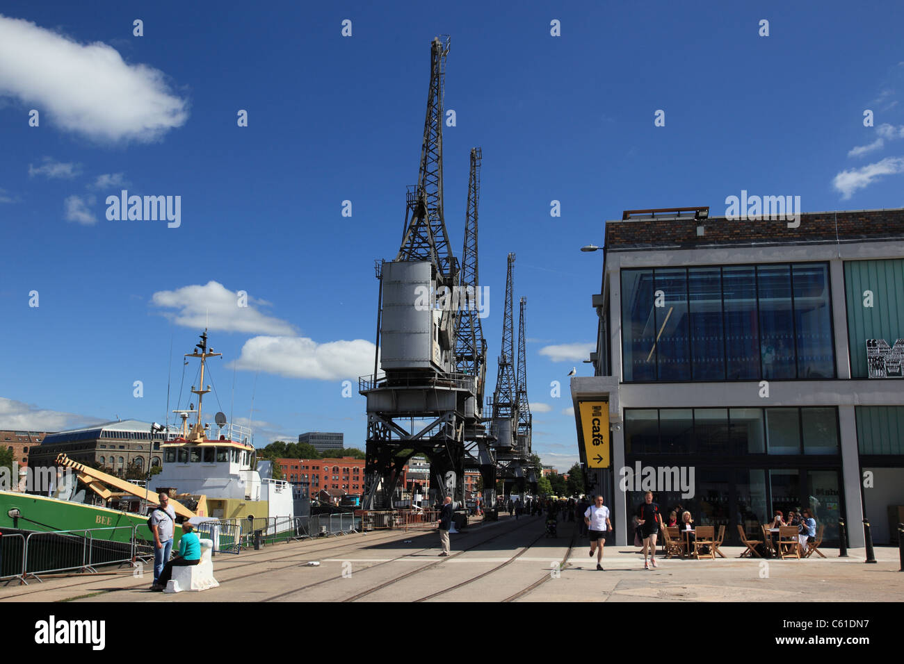 The M Shed’s electric cargo cranes, Bristol Docks, Bristol harbourside - floating harbour, City of Bristol, England, UK Stock Photo