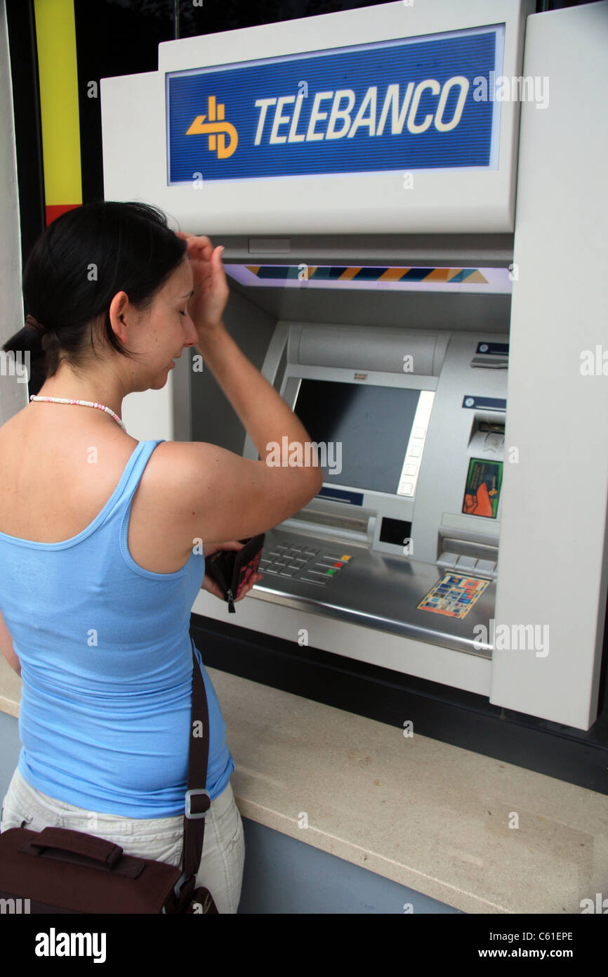 Trying to withdraw money in Menorca Stock Photo