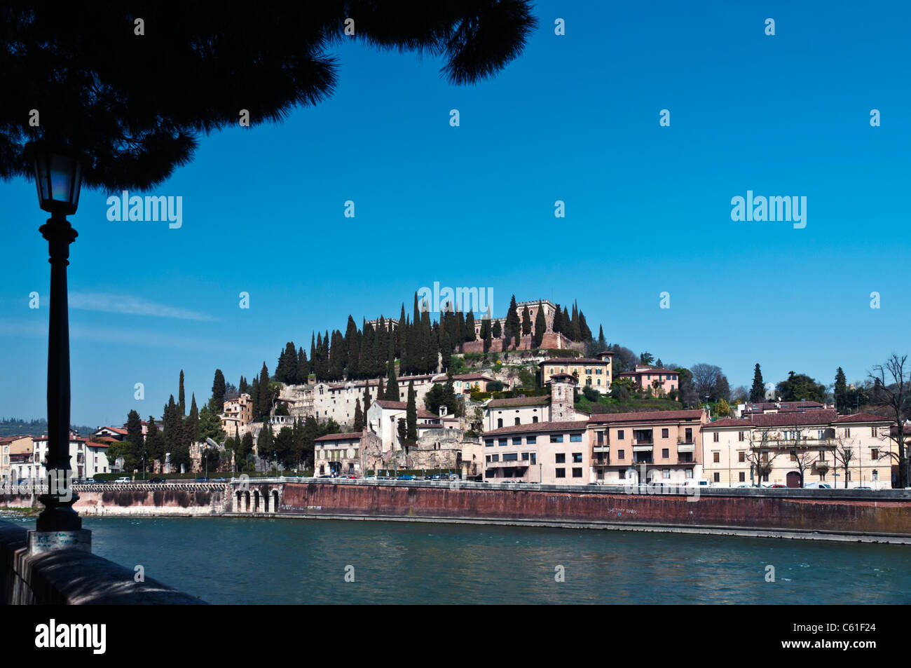 Populated hillside across the river Adige, Verona Italy Stock Photo