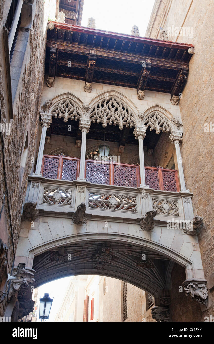 Spain, Barcelona, The Gothic Quarter, Bridge in Street Stock