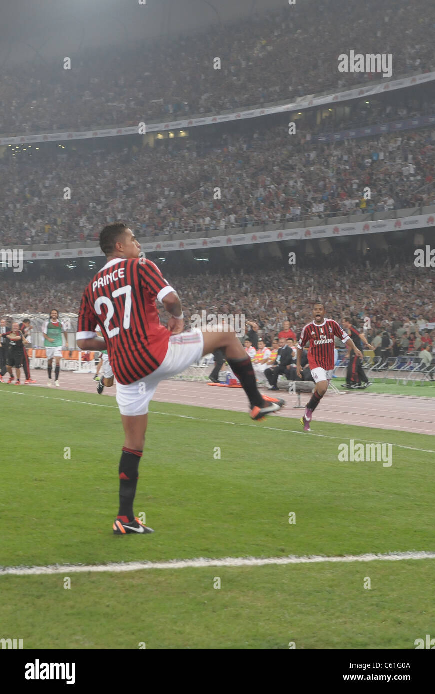 Kevin Prince Boateng of AC Milan celebrates his goal during the Italian Super Cup 2011 Stock Photo