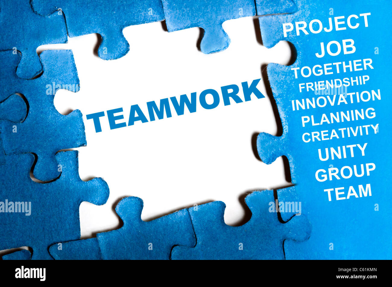 Teamwork blue puzzle pieces assembled Stock Photo