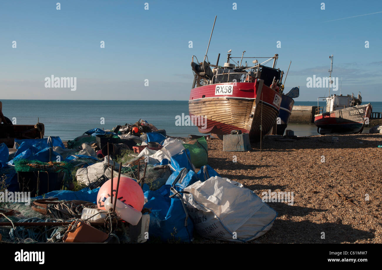 Hastings has the largest beach-based fishing fleet in England and the boats are moored on Harbour Beach. Stock Photo
