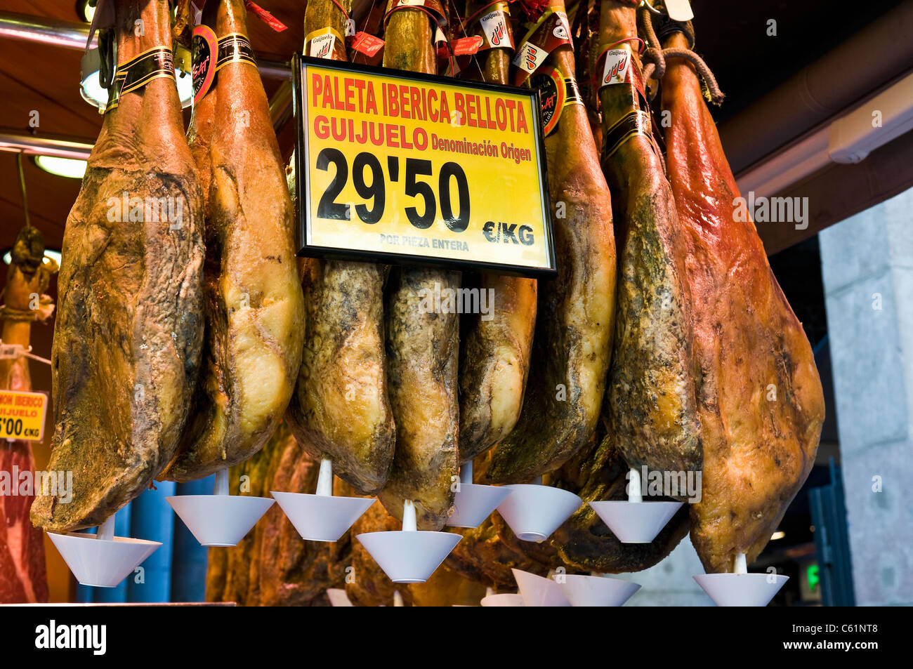 Display of ham at La Boqueria, Barcelona, Spain Stock Photo