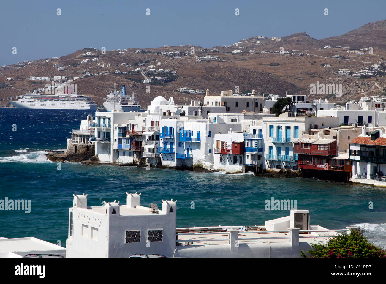 Mykonos, Greek island, part of the Cyclades. View over Mykonos city, old town and bay. Stock Photo