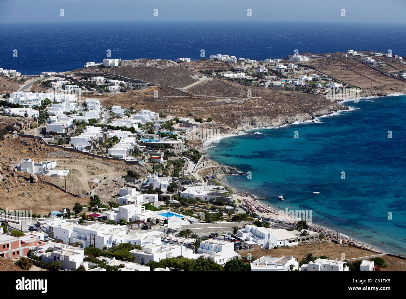 View over the bay of Ormos , south coast of Mykonos, Greek island, Europe. Stock Photo