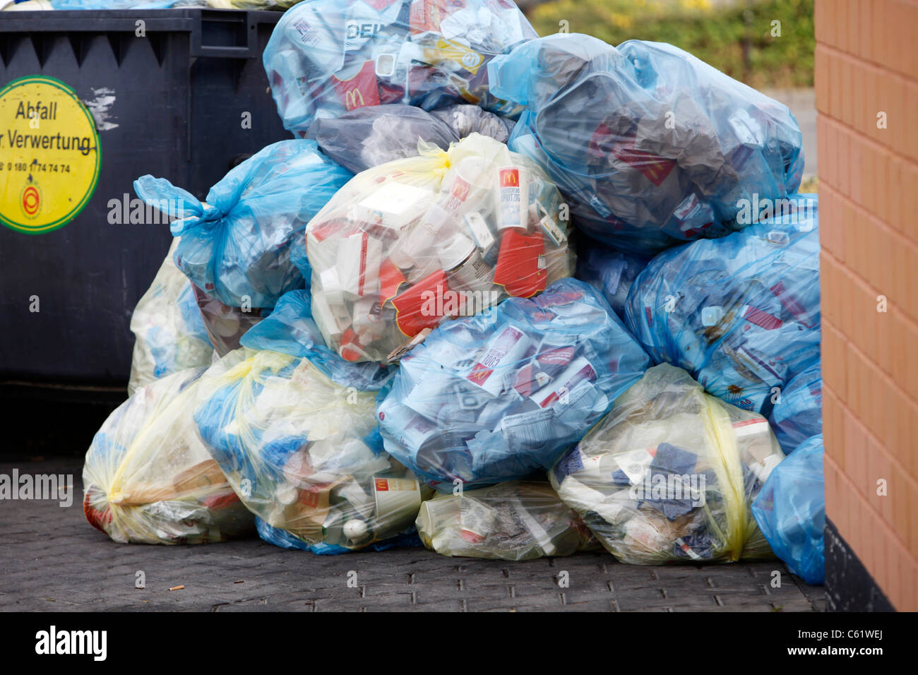 Trash of a fast food restaurant, packed in sacks. Stock Photo