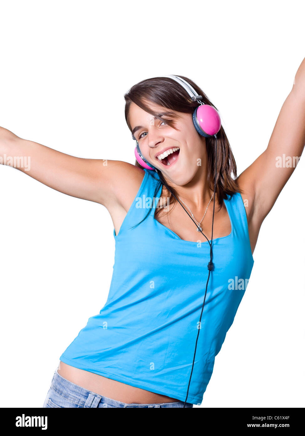 Cute young woman with headphones dancing on music Stock Photo - Alamy