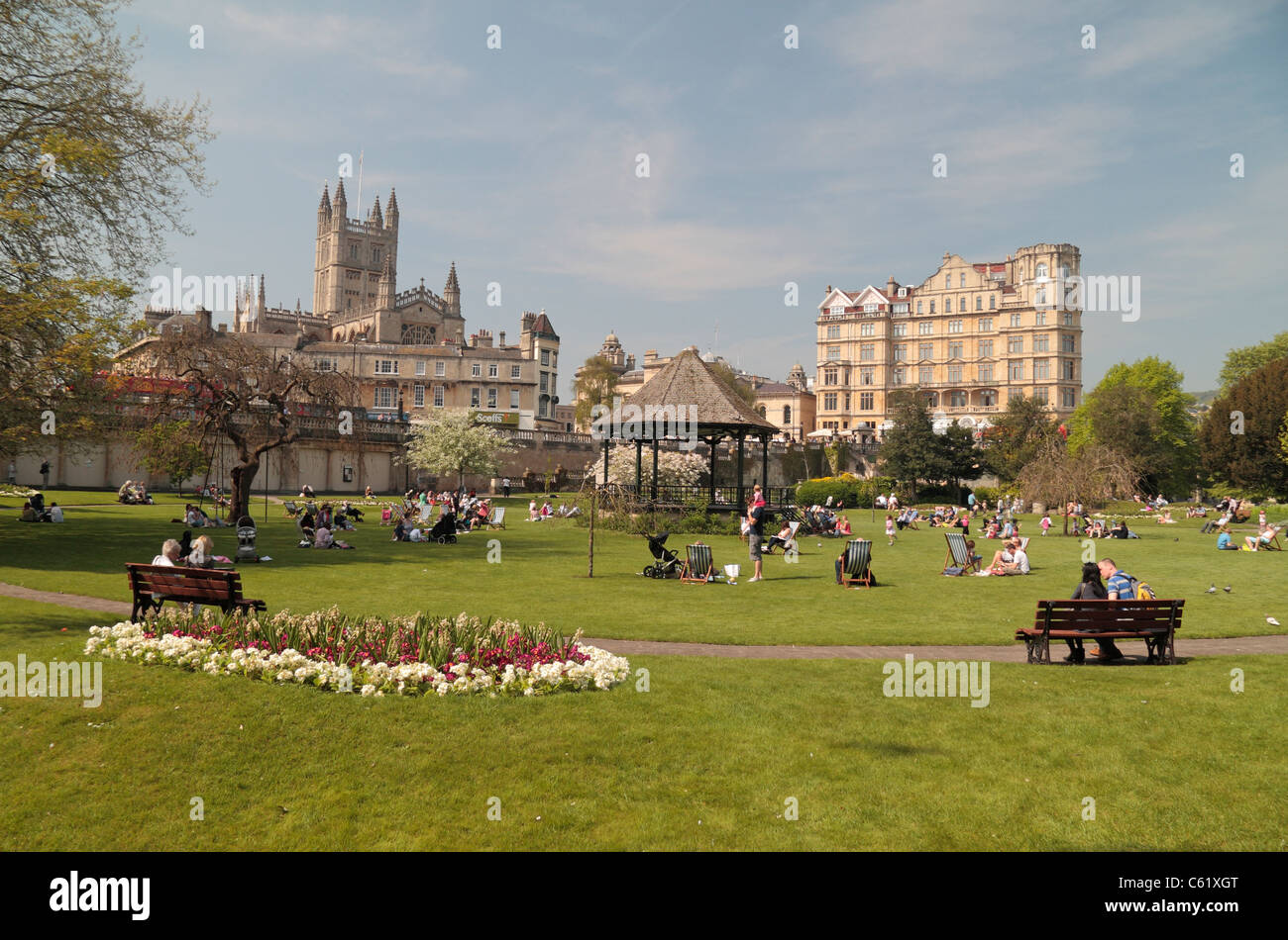 People enjoying the warm spring weather (Apr 2011) in Parade Gardens, Bath, England. Stock Photo
