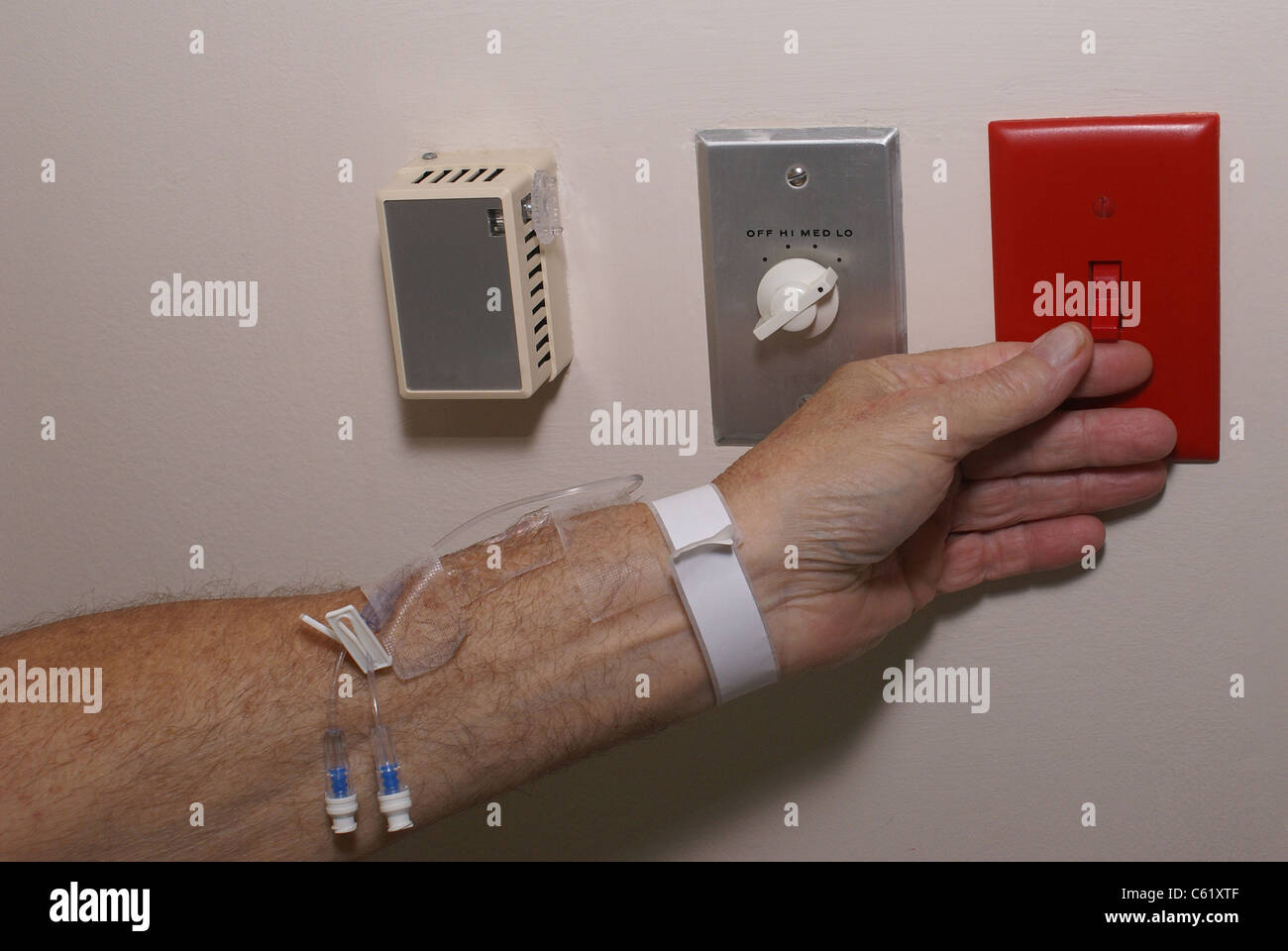 Switching on red light switch Stock Photo Alamy