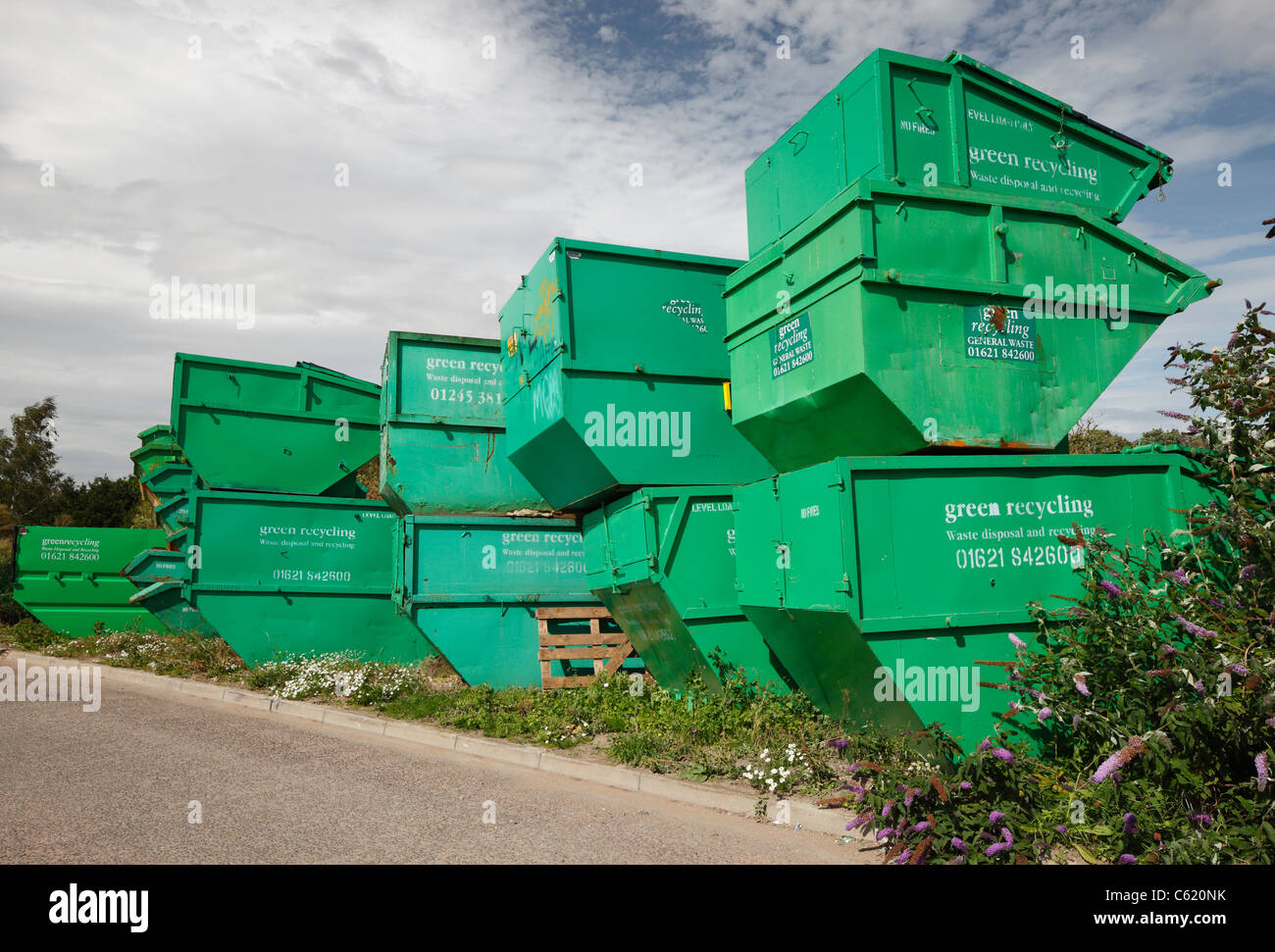 Pile of green recycling bins Stock Photo Alamy