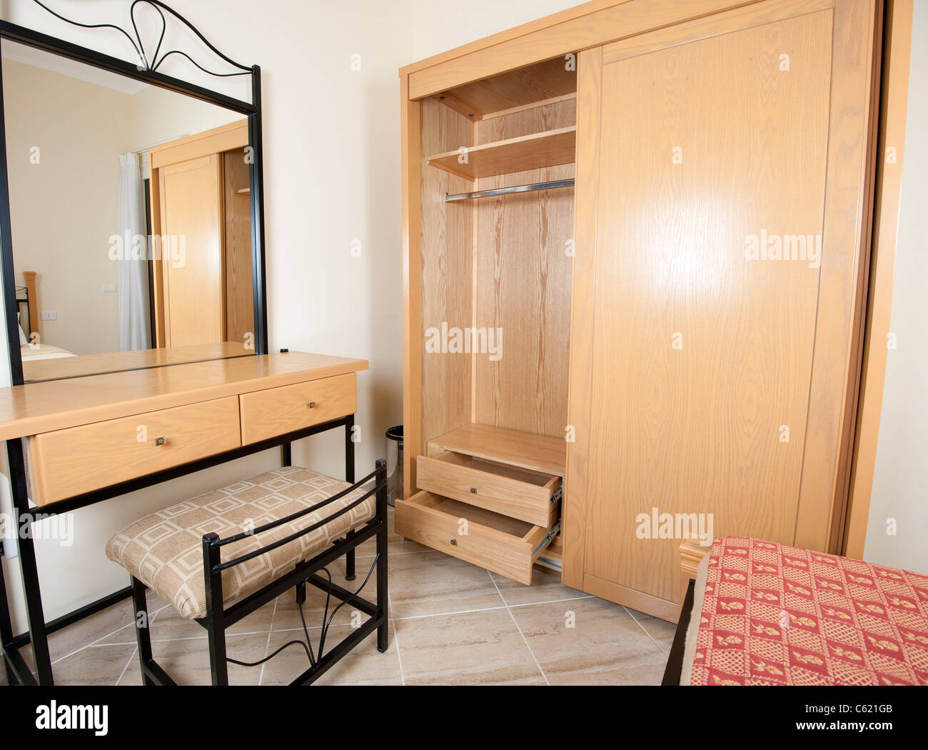 Interior design dressing table with mirror and wardrobe in a bedroom Stock  Photo - Alamy