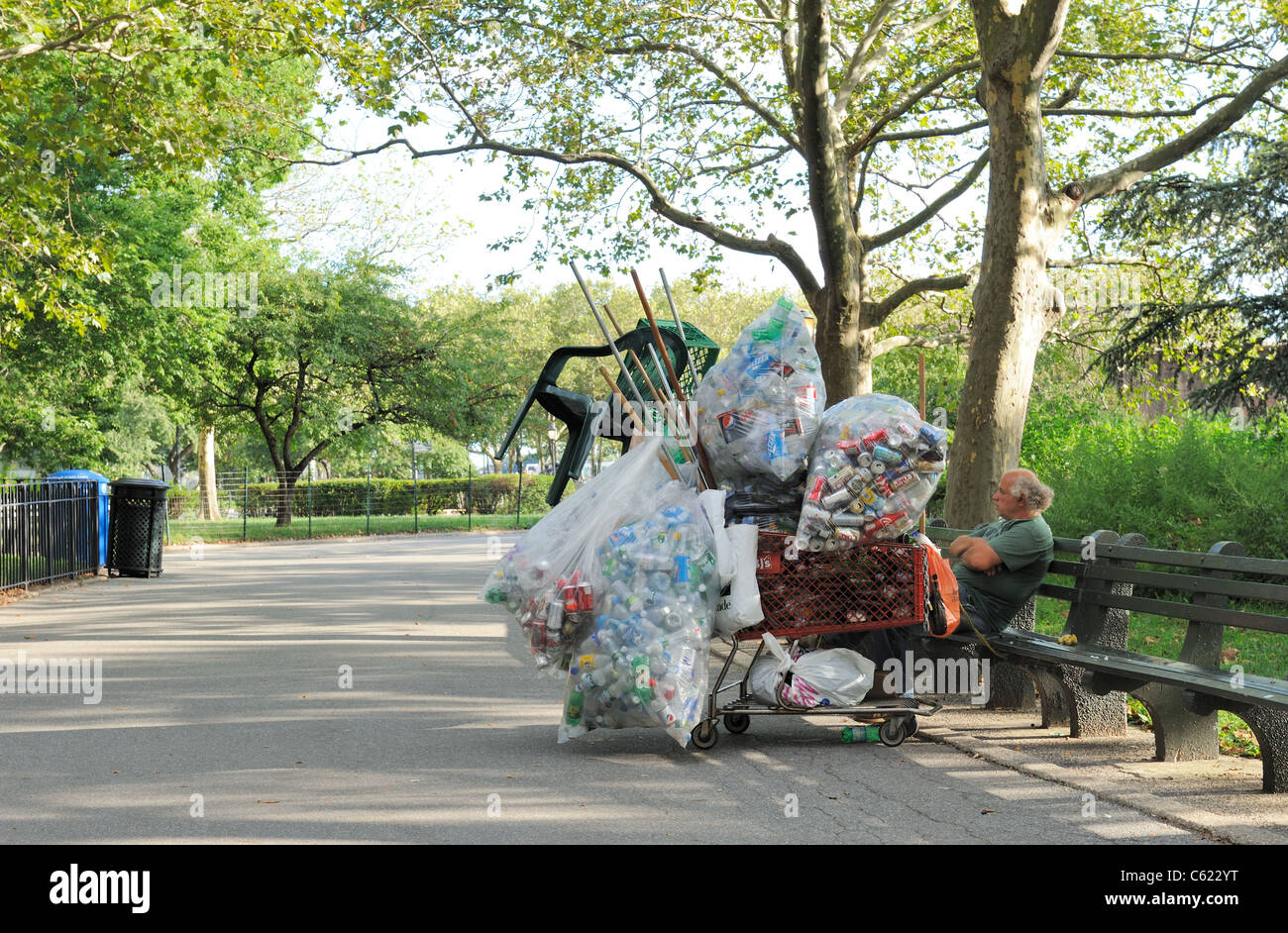 A homeless man in Battery Park had a cart full of cans that he had