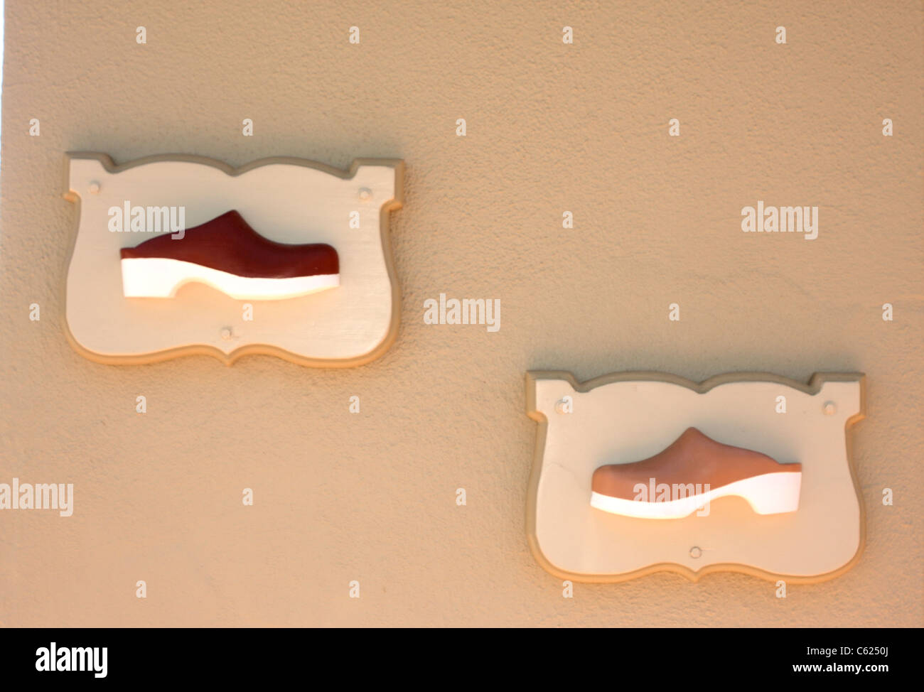 Framed clogs on the wall of a shop in Solvang, California Stock Photo