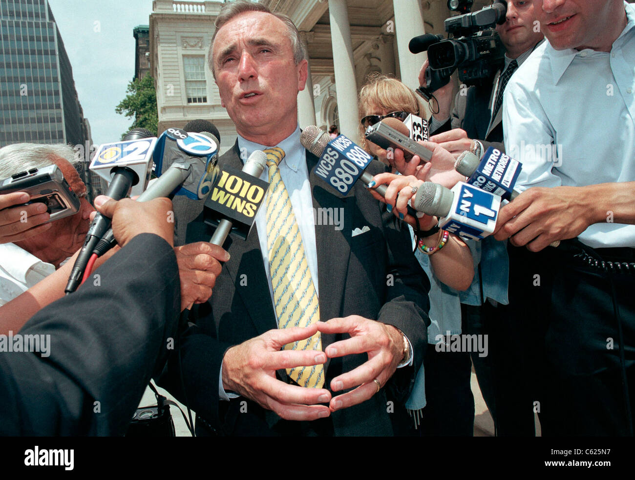 William Bratton at a news conference on the steps of City Hall on July 5, 2001 Stock Photo