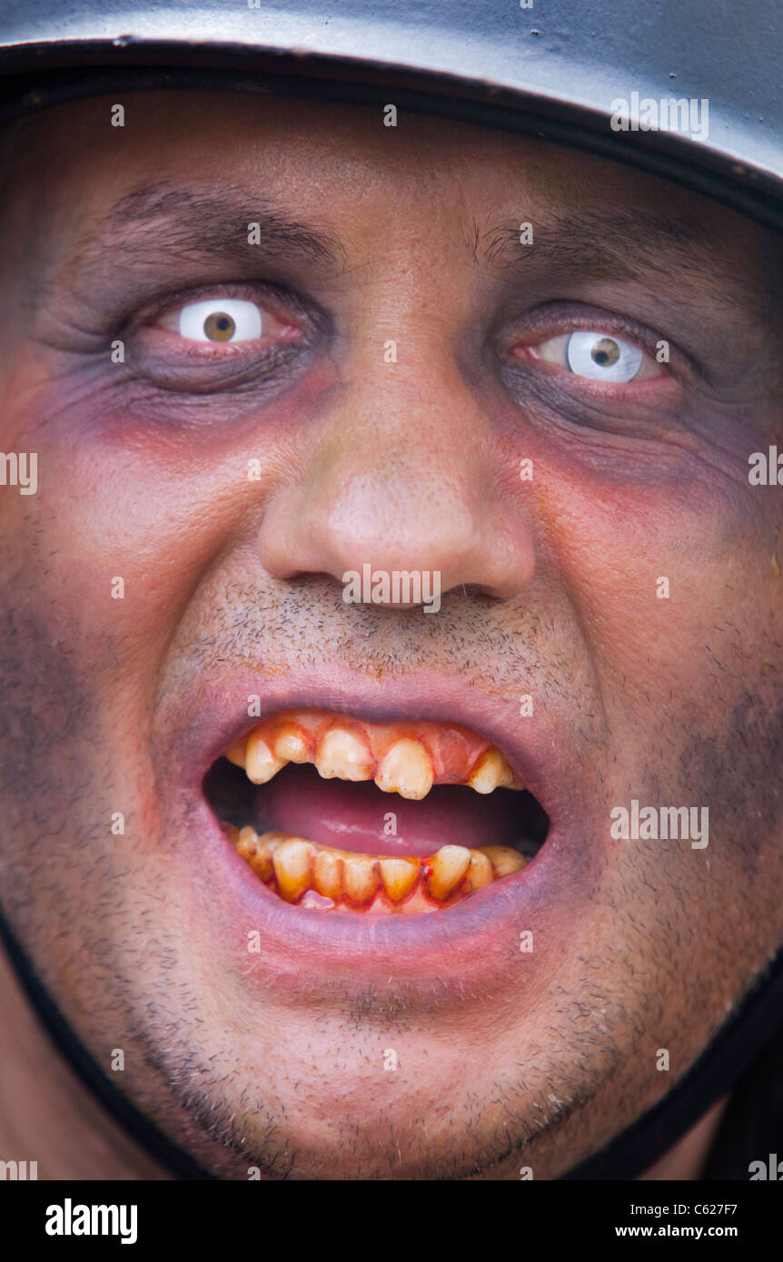 Man dressed as a Zombie at the Film and Comic Convention in London. Stock Photo