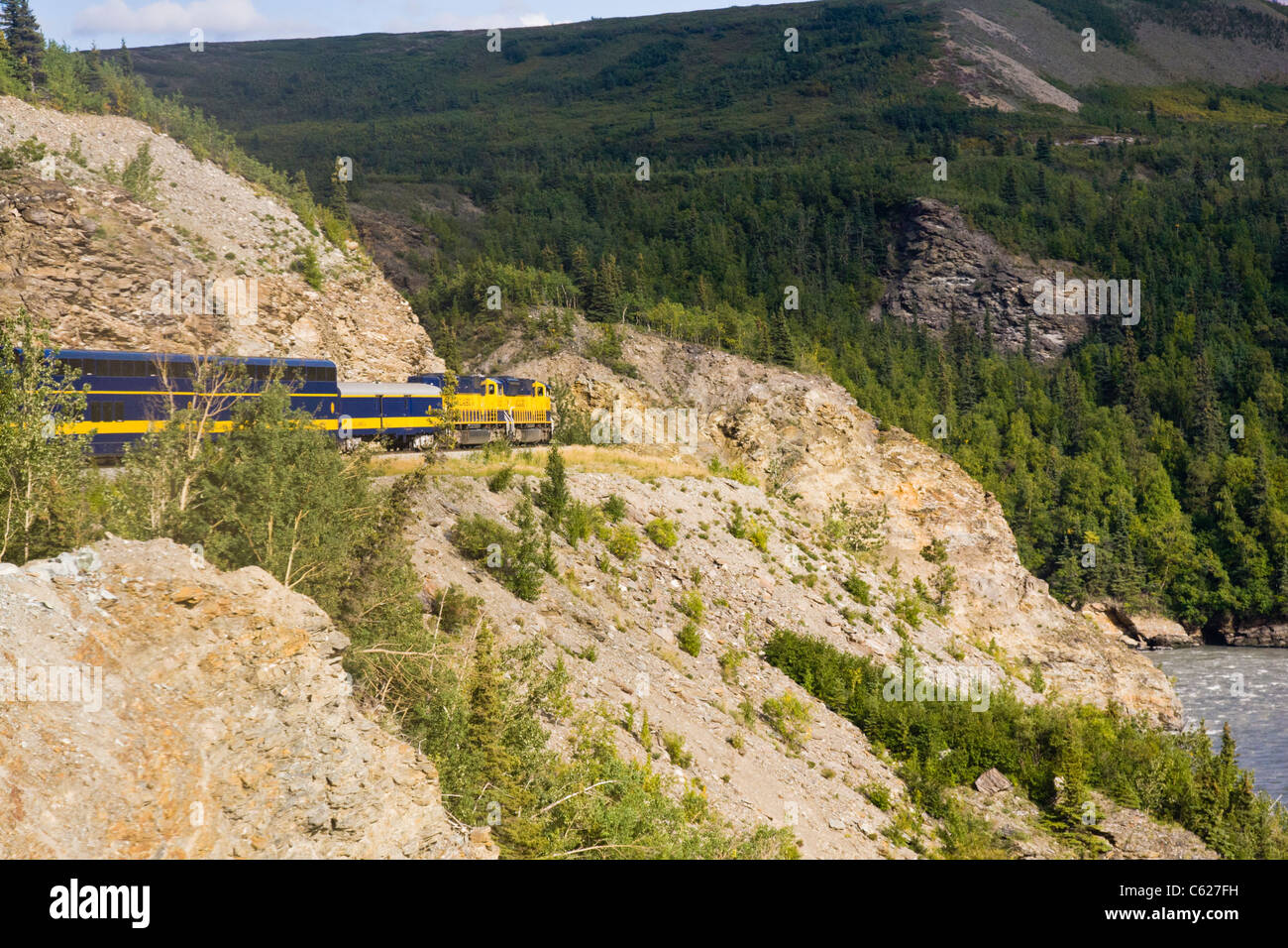 Alaskan Railroad train running alongside the Nenana River in Alaska. Stock Photo