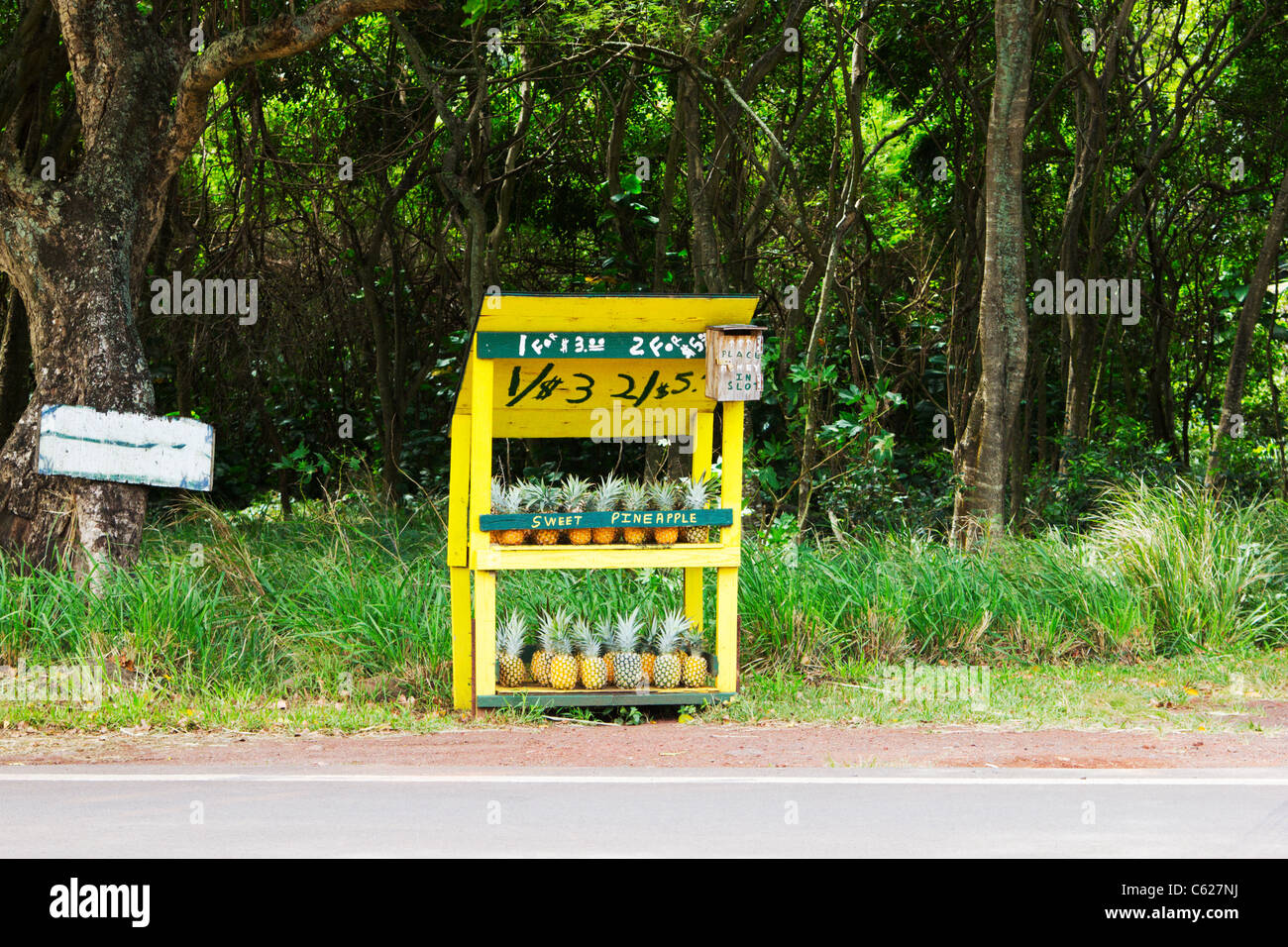 Pinapples for sale at roadside stand Maui Hawaii Stock Photo