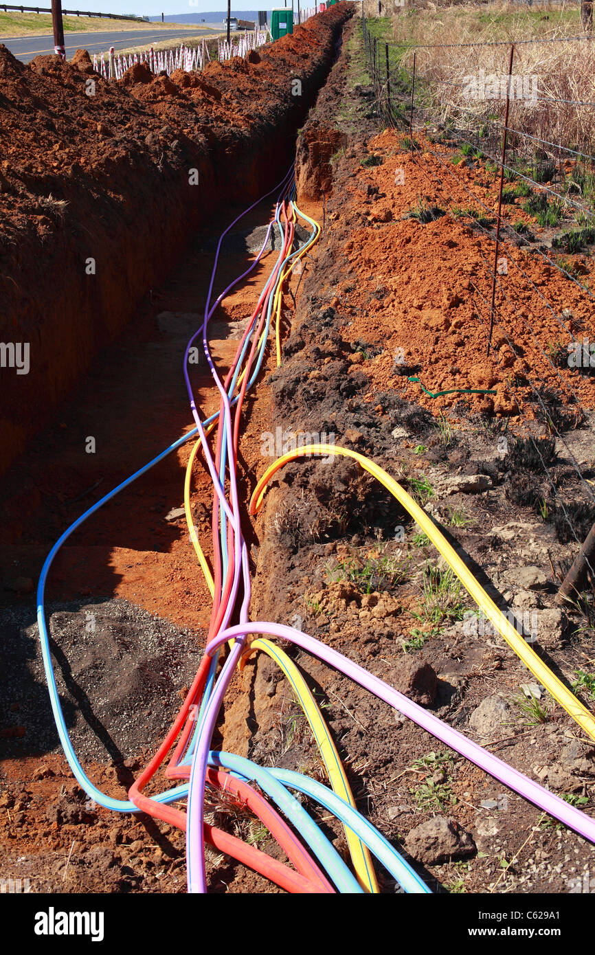 Fibre optic cable being installed alongside the 600km N3 highway between Johannesburg and Durban in South Africa. Stock Photo