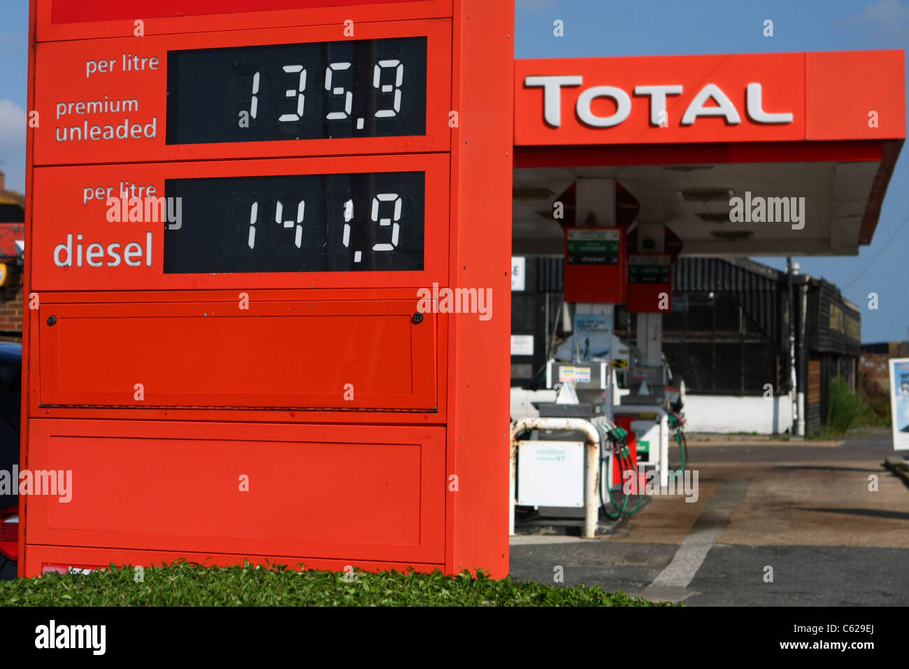 a side view of a Total petrol station showing the price of petrol and diesel Stock Photo