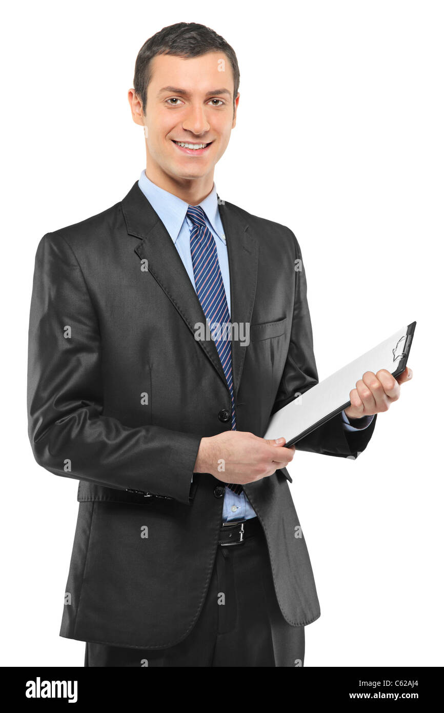 A smiling businessman holding a clipboard Stock Photo - Alamy