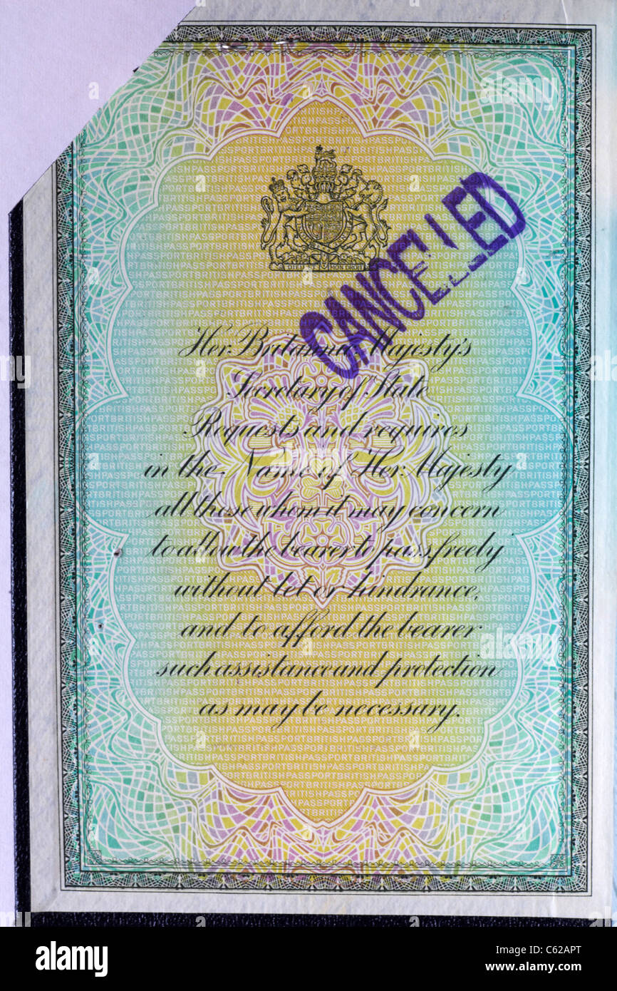 Cancelled British passport with corner cut off Stock Photo