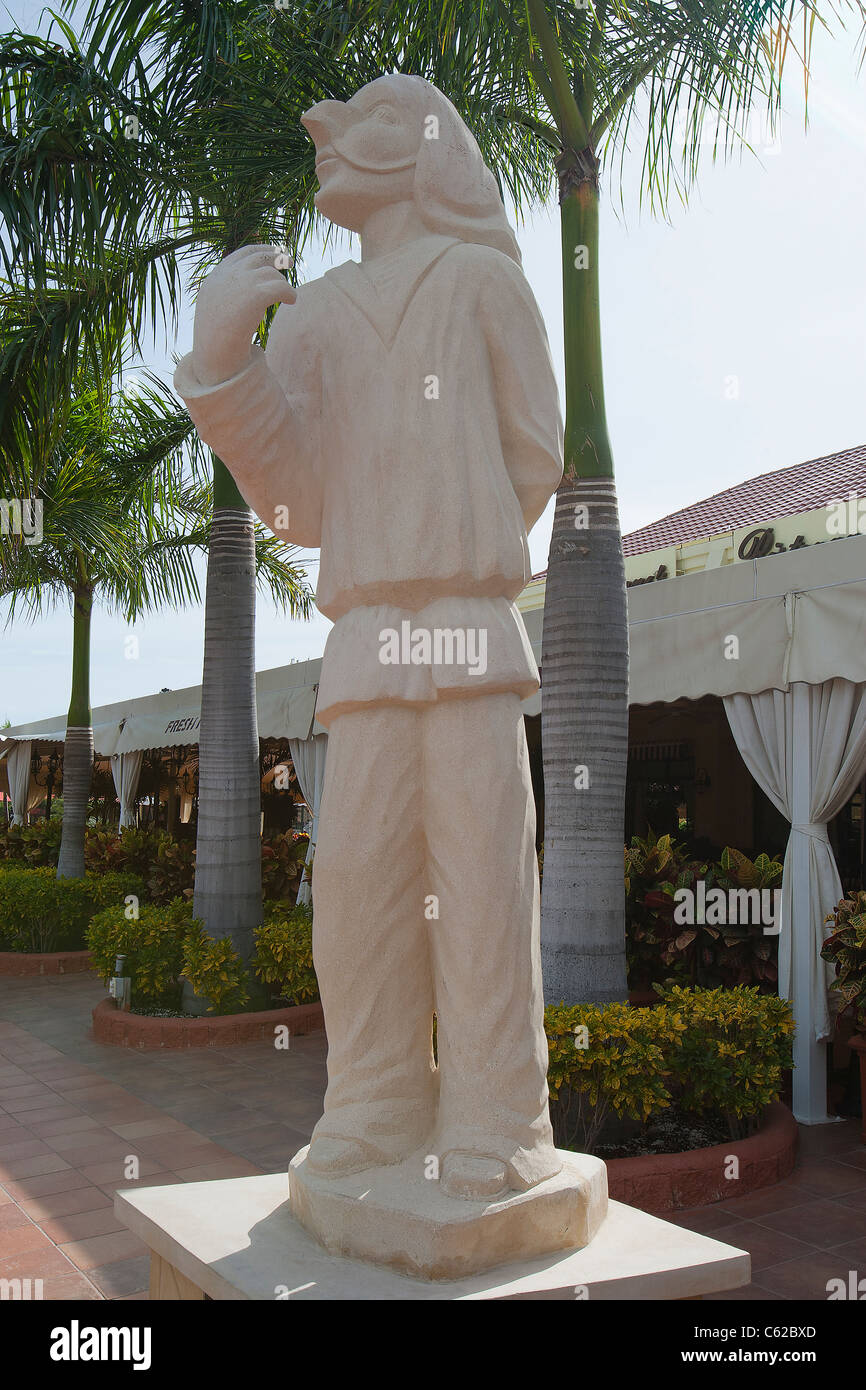 Statue of Pulcinella (aka Punch, Punchinello or Polichinelle) outside Gianni's italian restaurant, Aruba, Dutch Caribbean Stock Photo