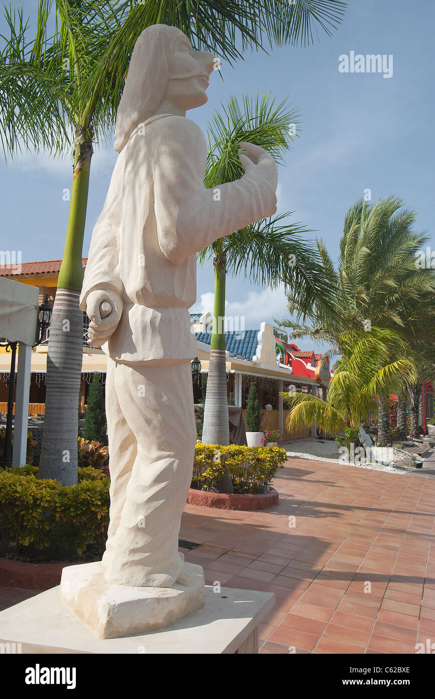 Statue of Pulcinella (aka Punch, Punchinello or Polichinelle) outside Gianni's italian restaurant, Aruba, Dutch Caribbean Stock Photo