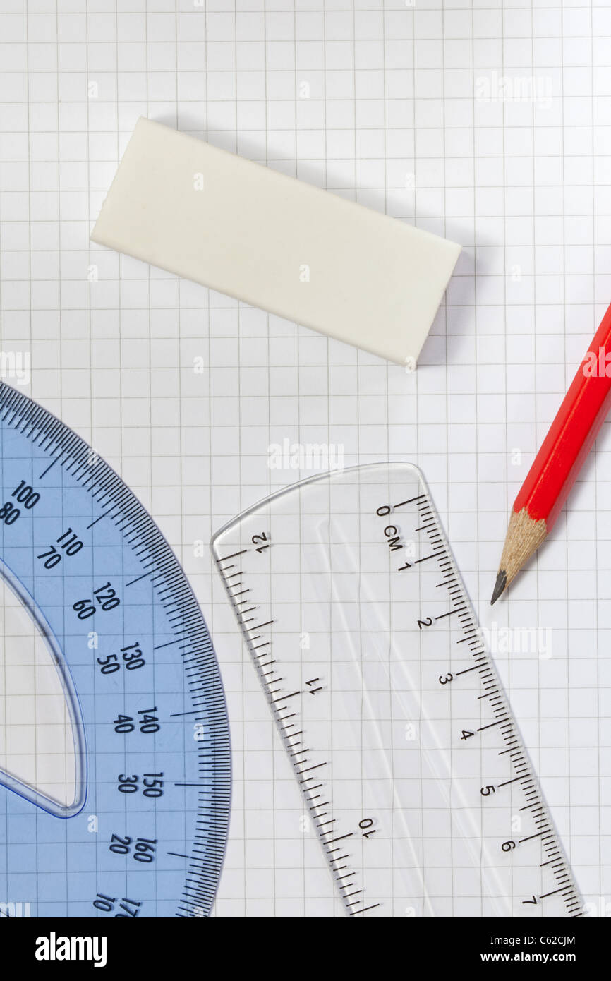 Drawing equipment on squared paper Stock Photo