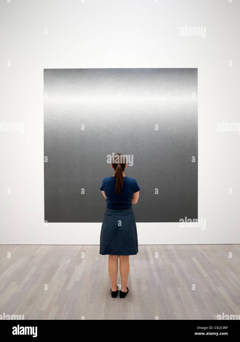 Woman looking at painting Scribbles, Wall Drawing 1227 by Sol LeWitt at art museum K20 or Kunstsammlung at Grabbeplatz Dusseldo Stock Photo