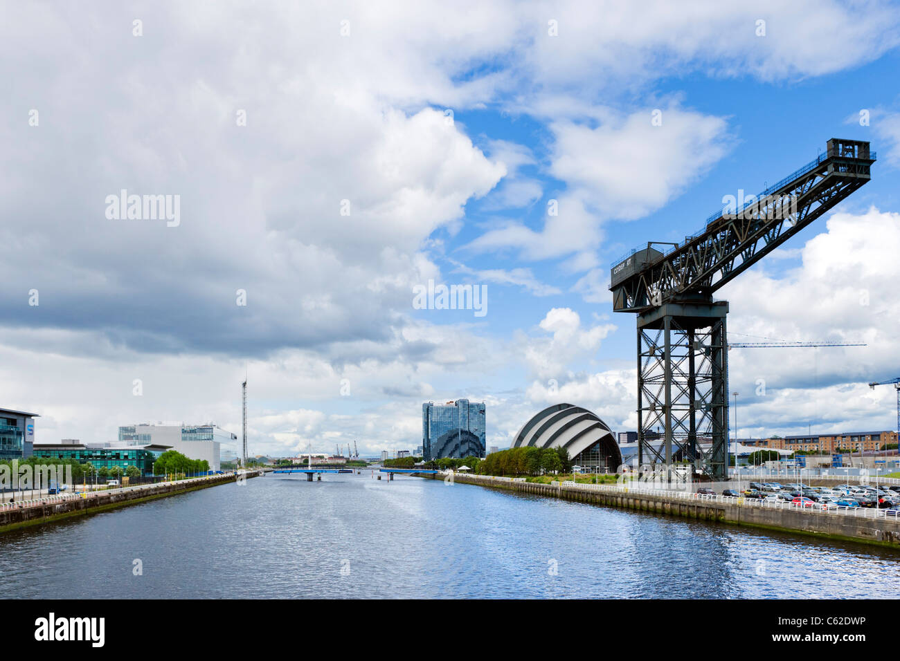 View down the River Clyde towards 'The'Armadillo' (the Clyde Auditorium) and Finnieston Crane, Glasgow, Scotland Stock Photo